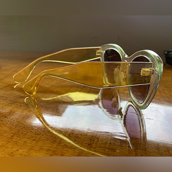 Cat Eye Sunglasses. Clear Frames with Golden Tone Temples - Picture 5 of 6